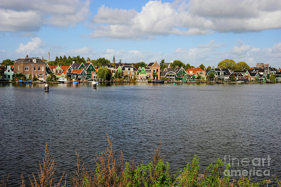 Old world Dutch architecture houses along the river.   Photograph by Gunther Allen