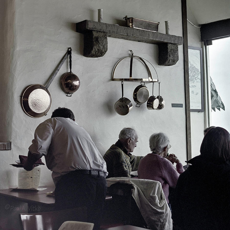 Older couple having coffee Photograph by Paul Vitko