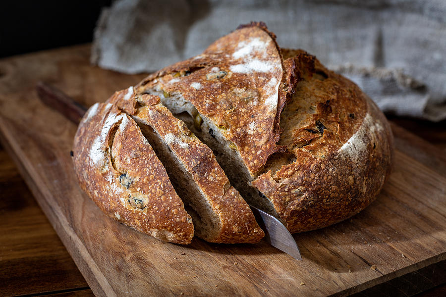 Olive and rosemary sourdough bread Photograph by Socreative_media