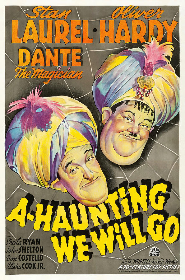 OLIVER HARDY and STAN LAUREL in A-HAUNTING WE WILL GO -1942-, directed by ALFRED L. WERKER. Photograph by Album