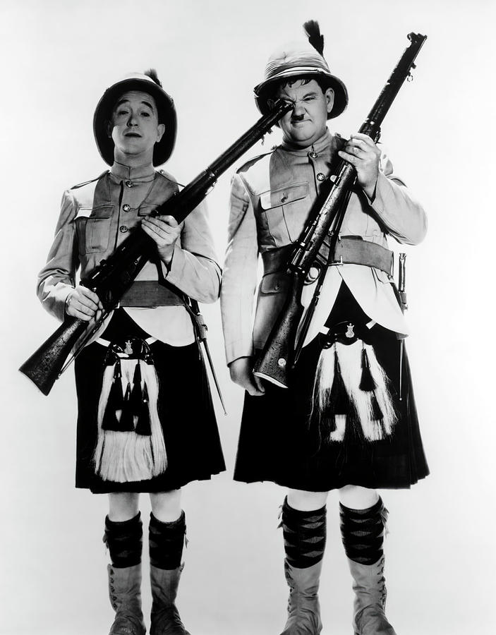 OLIVER HARDY and STAN LAUREL in BONNIE SCOTLAND -1935-, directed by JAMES W. HORNE. Photograph by Album