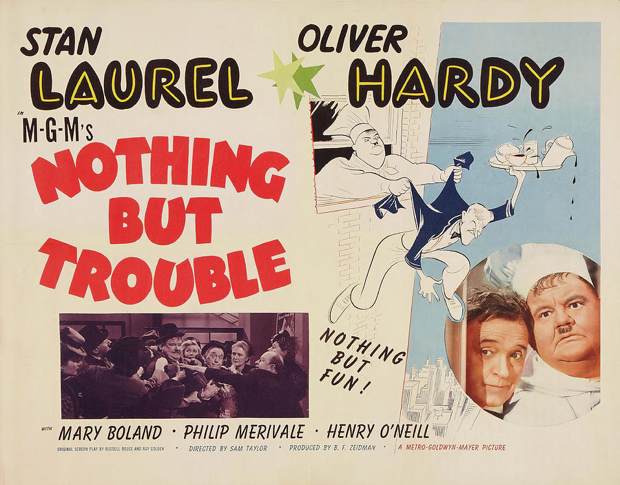 OLIVER HARDY and STAN LAUREL in NOTHING BUT TROUBLE -1944-, directed by SAM TAYLOR. Photograph by Album