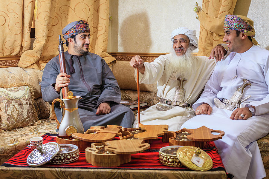 Omani halwa makers Photograph by Alexey Stiop