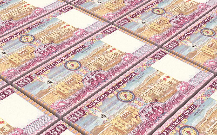 Omani rials bills stacked background. Photograph by Ppart
