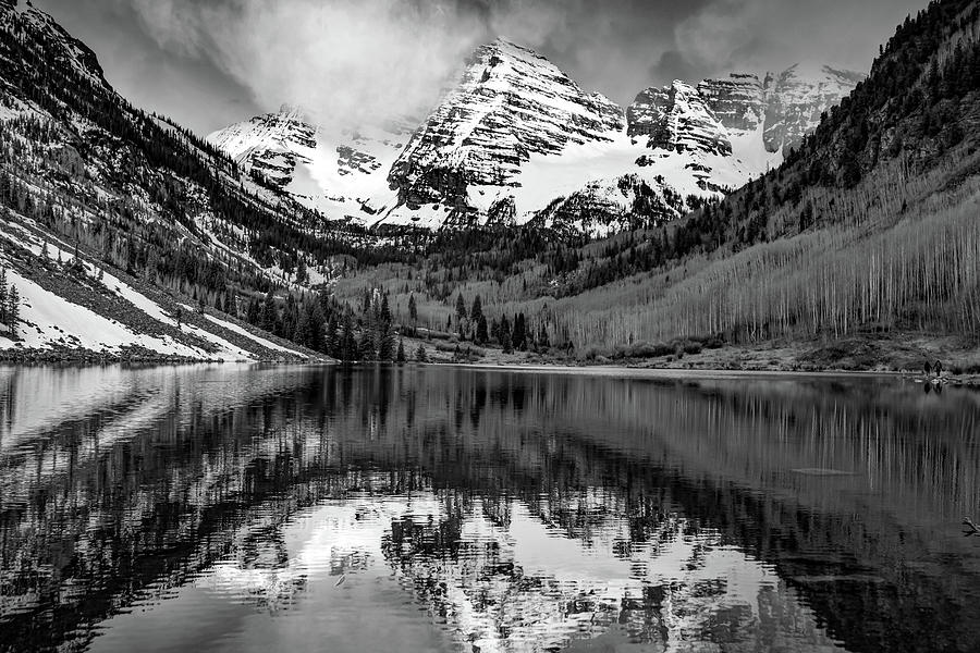 Ominous Clouds Over Maroon Bells In Black And White Photograph