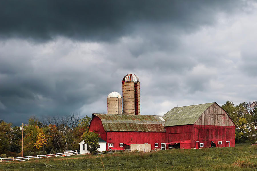 Red Barn with Ominous Storm Sky-  Art print Photograph by Kenneth Lane Smith