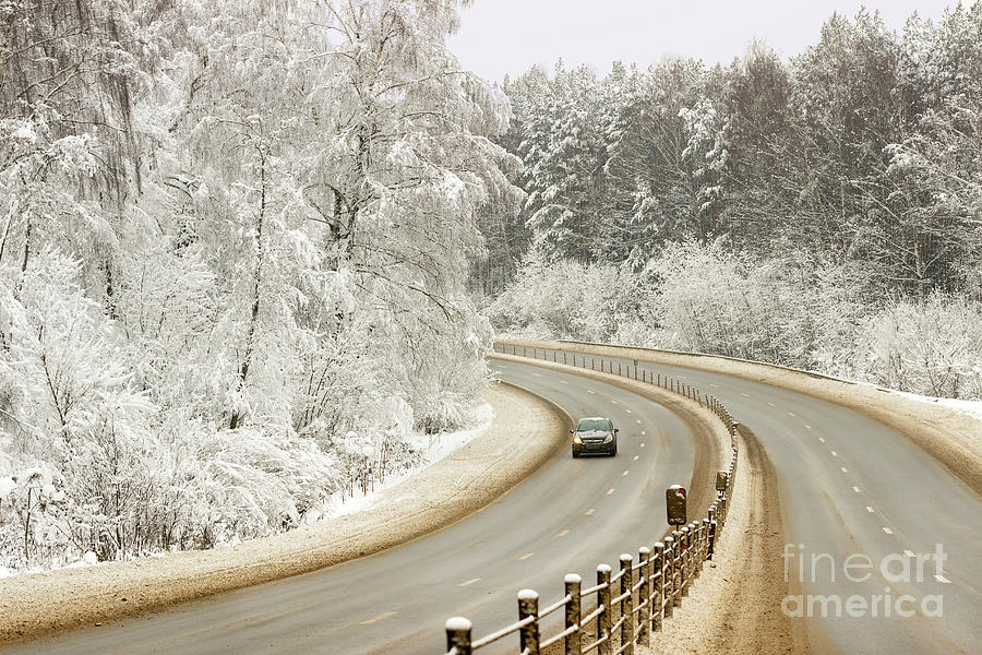 Winter Photograph - On a winter road. by Larissa Antonova