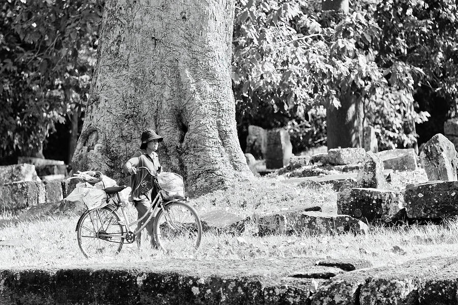 On bicycle at Angkor Wat. Cambodia. Photograph by Lie Yim
