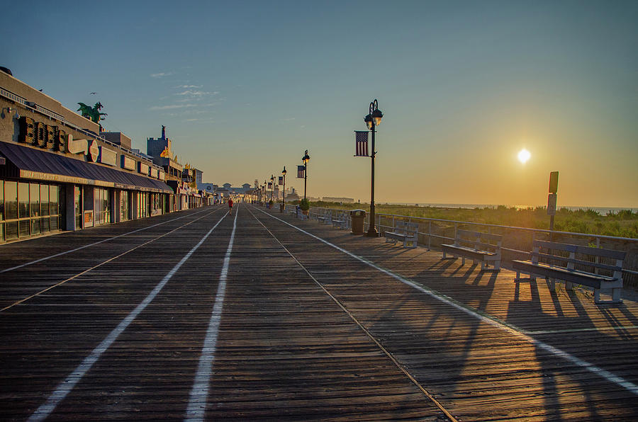 On the Boardwalk at Sunrise - Ocean City New Jersey Photograph by Bill Cannon