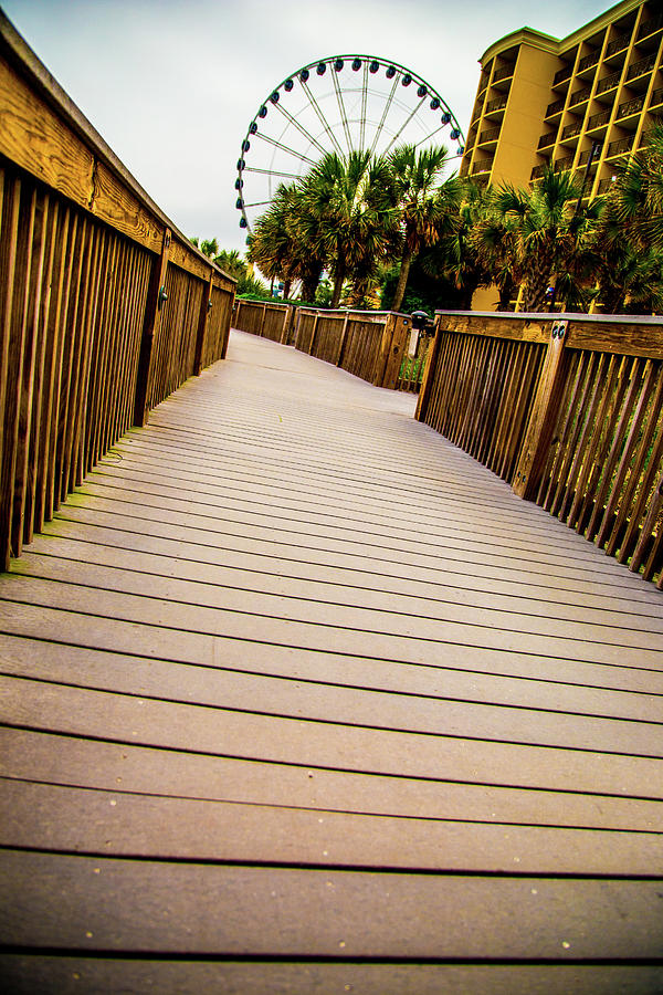 On The Follow The Boardwalk at Mrytle Beach Photograph by Karol Livote