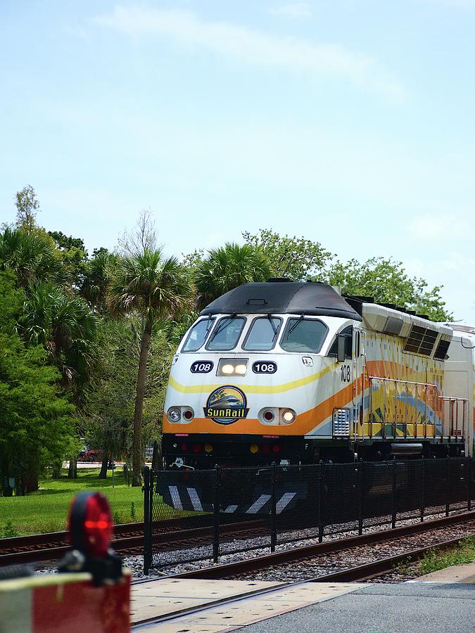 Oncoming Sun Rail Train  Photograph by Christopher Mercer