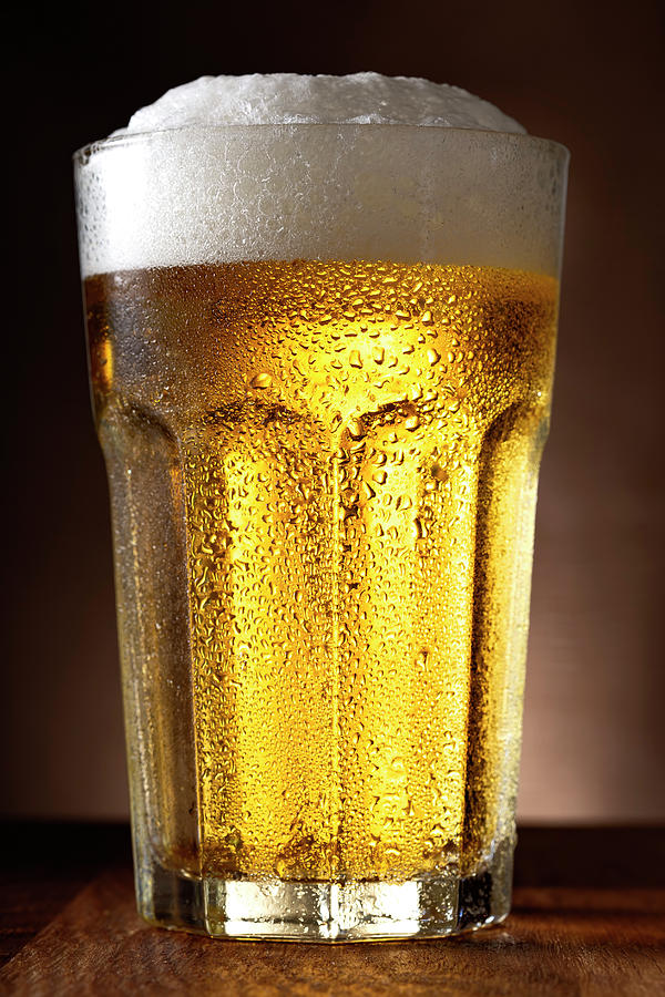 One glass of beer  Photograph by Sebastian Radu