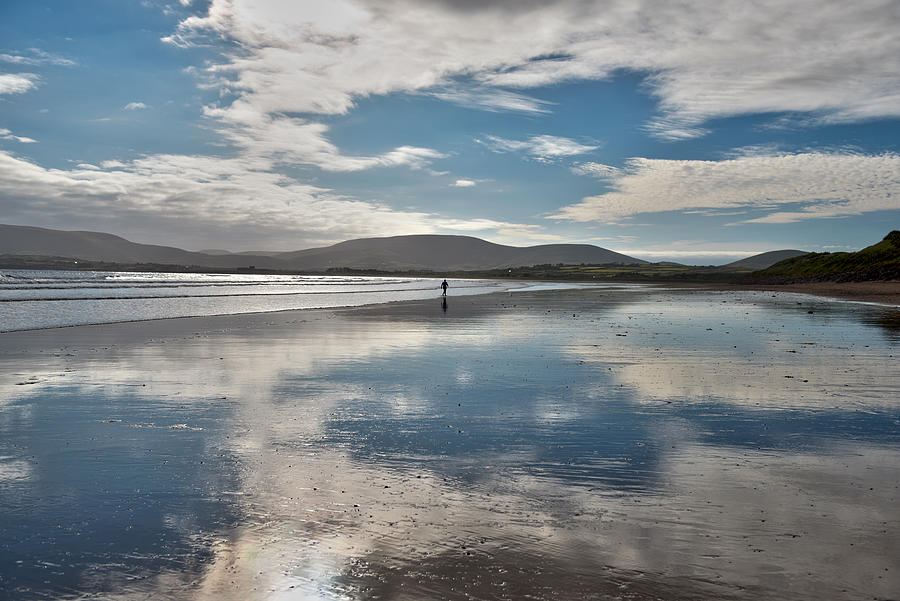 One person walking on the beach of Waterville in Ireland Photograph by Feifei Cui-Paoluzzo