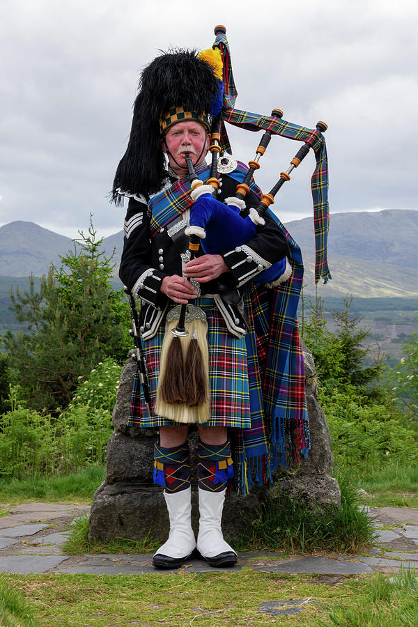One piper piping Photograph by Steev Stamford