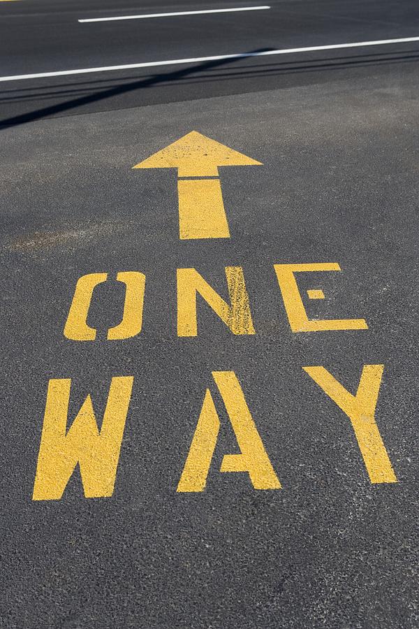 One way road marking Photograph by Image Source