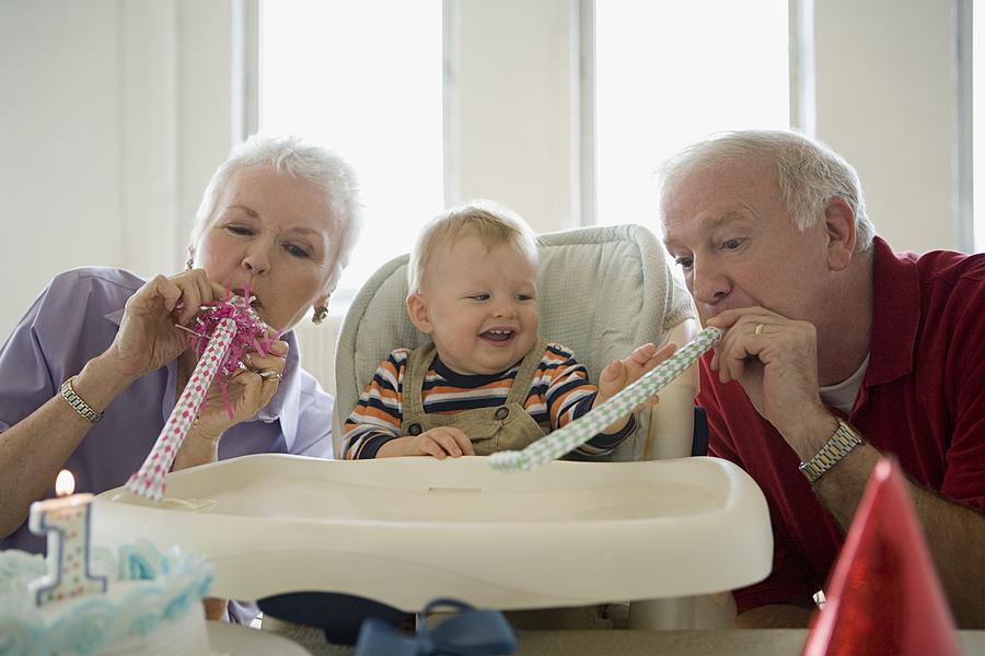 One year old with grandparents Photograph by Image Source