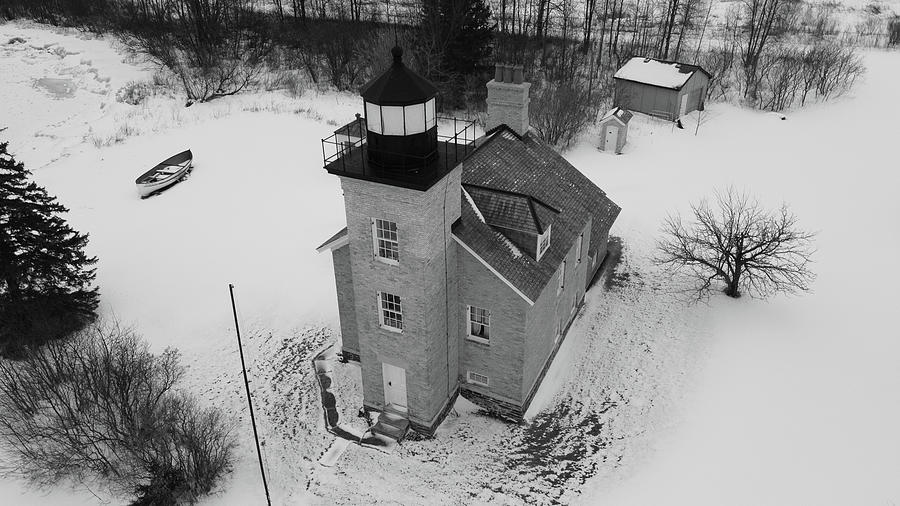 Ontonagon Michigan Lighthouse along Lake Superior in winter black and white Photograph by Eldon McGraw