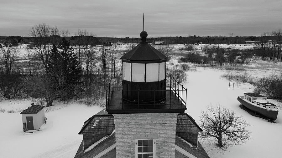 Ontonagon Michigan Lighthouse along Lake Superior in winter in blackened white Photograph by Eldon McGraw