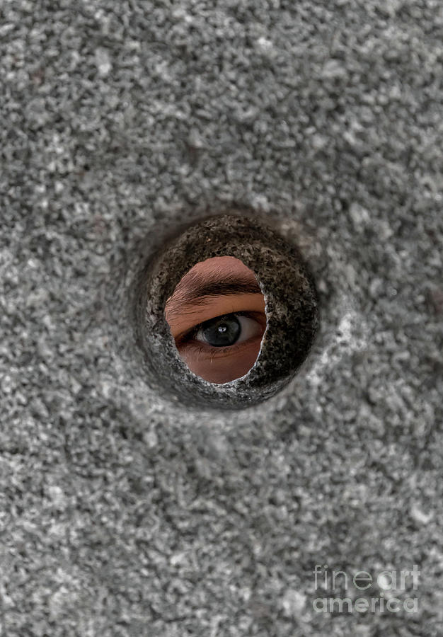 Open Eye Looking Through Round Hole In Stone Wall Photograph by Andreas Berthold