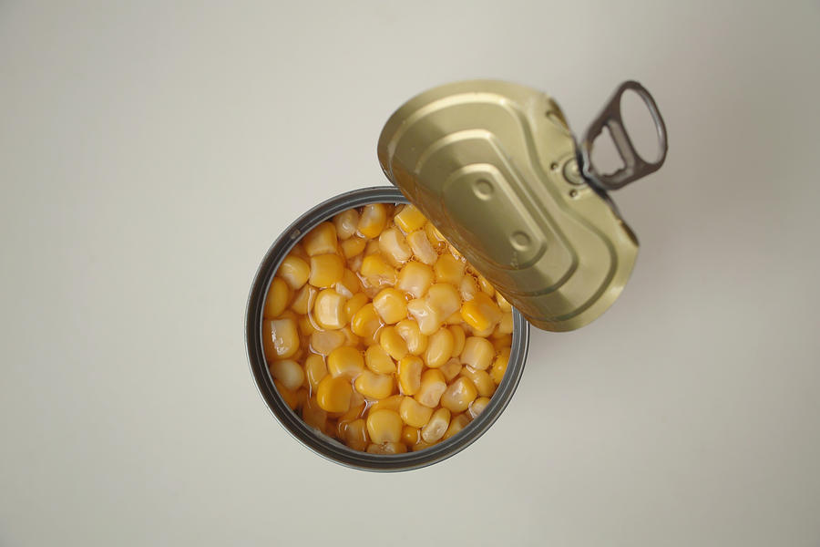 Open the canned corn Photograph by Canacol