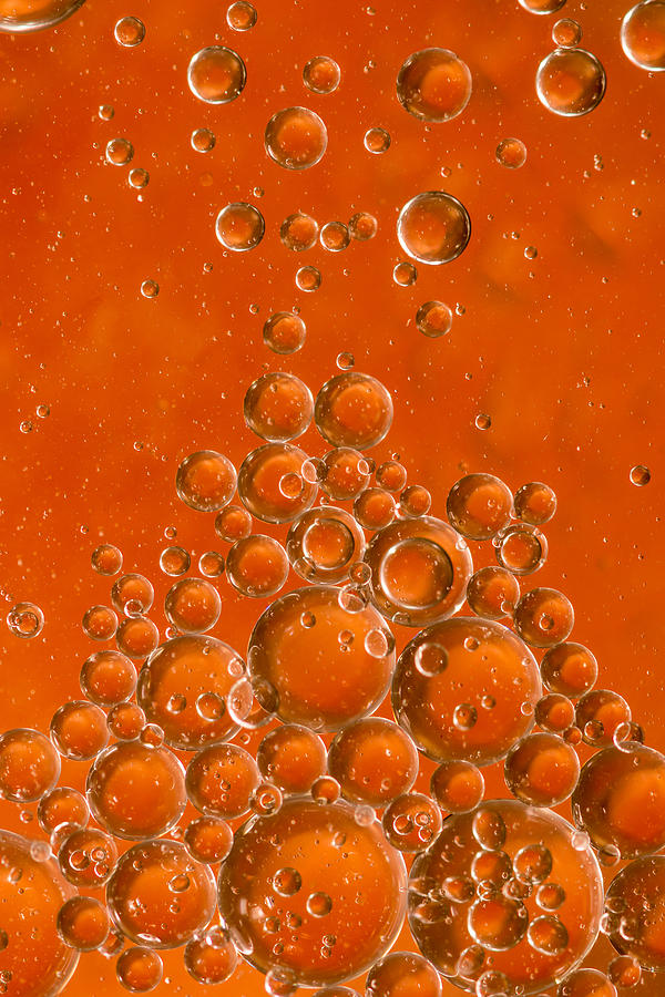 Orange air bubbles rising Photograph by ConstantinCornel