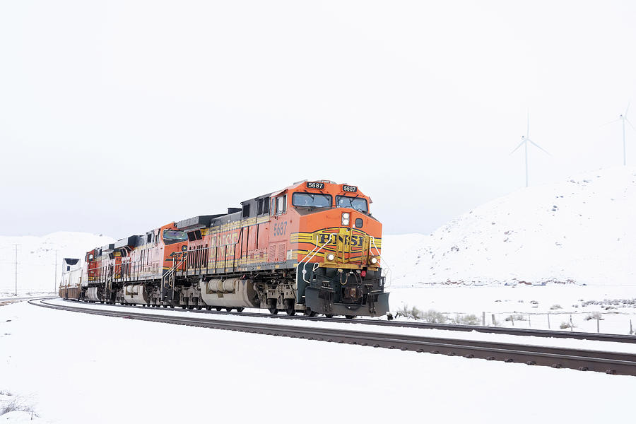 Orange -- BNSF Intermodal Train in Snow-Covered Mountains near Tehachapi, California Photograph by Darin Volpe