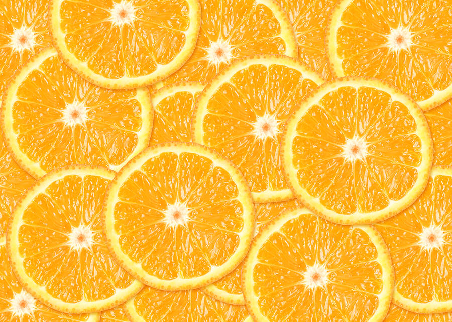 Orange fruit background Photograph by Kosziv