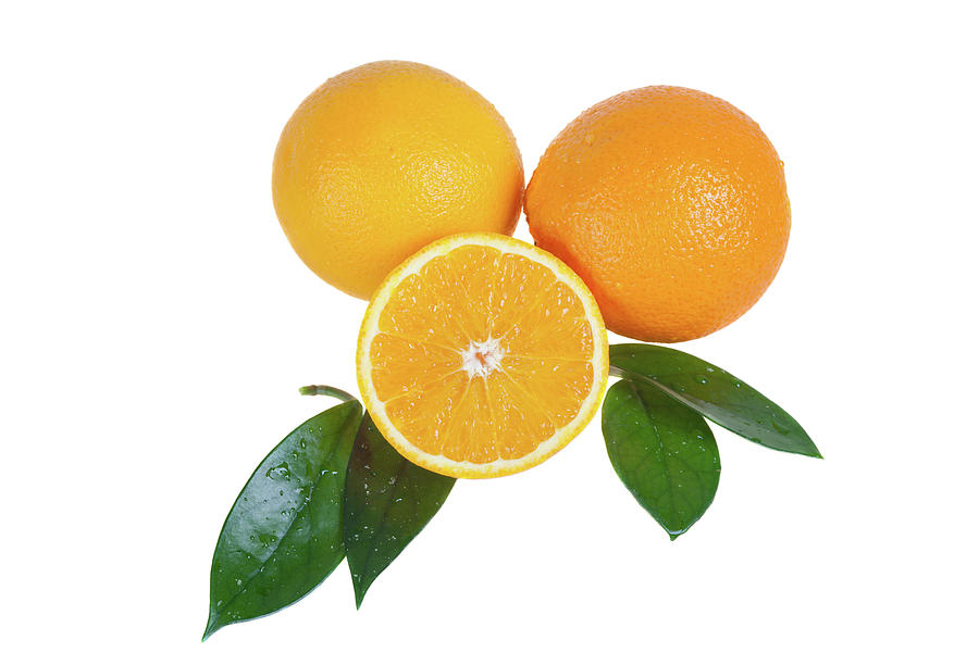 Orange Fruit With Leaves Photograph