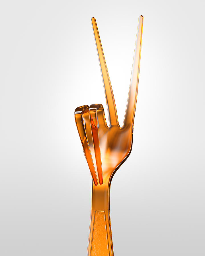 Orange plastic fork with prongs forming a V Photograph by I Like That One