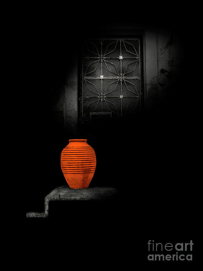 Orange Pot And Beam Of Light Photograph by Tatiana Bogracheva