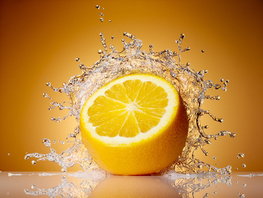 Orange Splash Photograph by Chris Stein