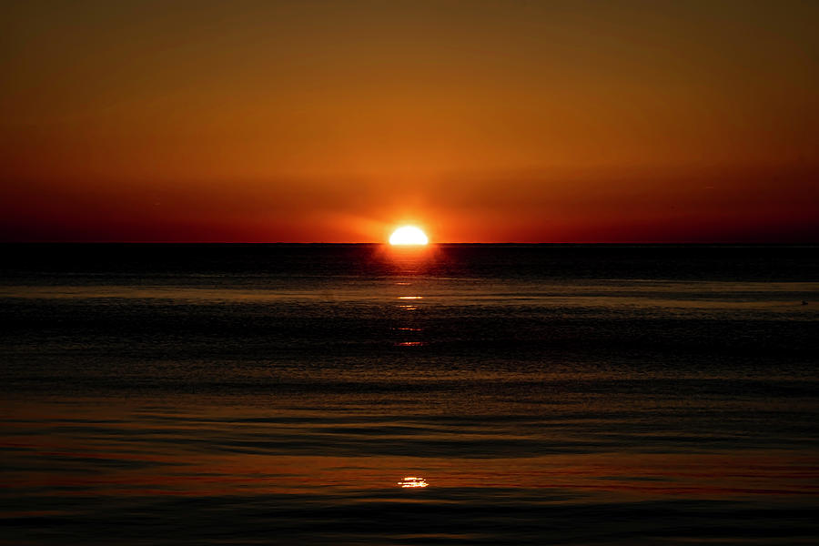 Orange sun rise on Lake Michgan Photograph by Sven Brogren