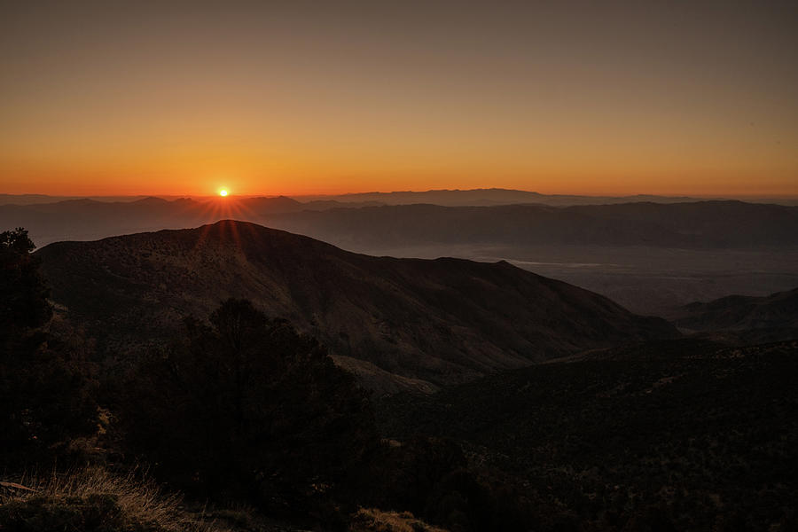 Orange Sunburst Rises Over the Death Valley Mountains Photograph by Kelly VanDellen