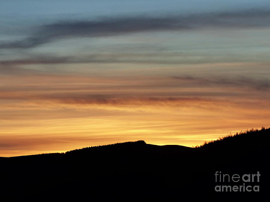 Sunset over the hills Photograph by Phil Banks