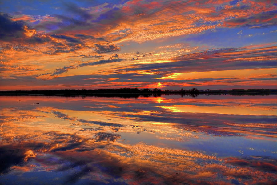 Orange Sunset Over South Rice Lake Photograph by Dale Kauzlaric