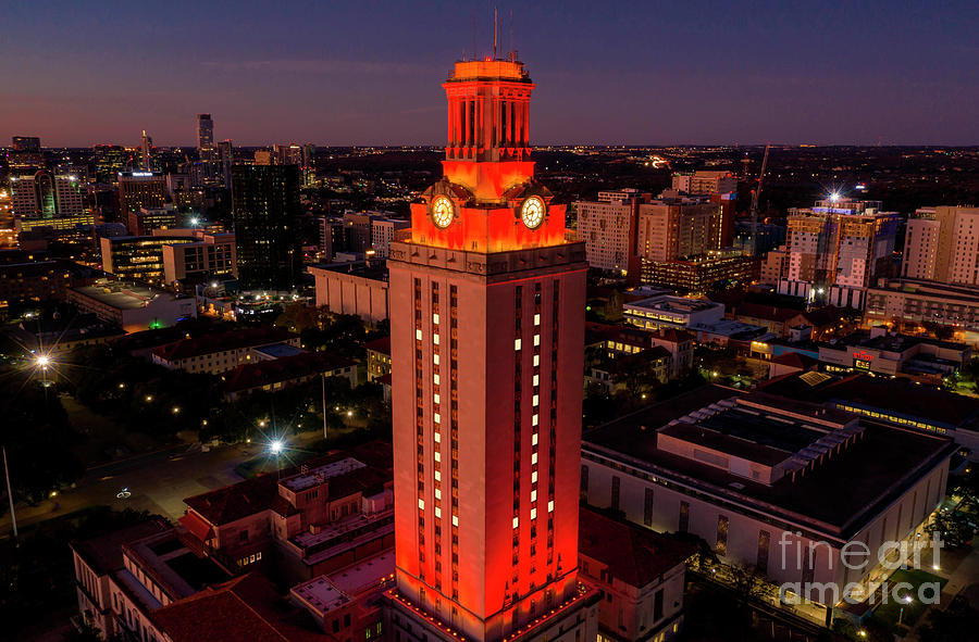 Sunset Photograph - Orange UT Tower lit with #1 to celebrate a national championship by Dan Herron