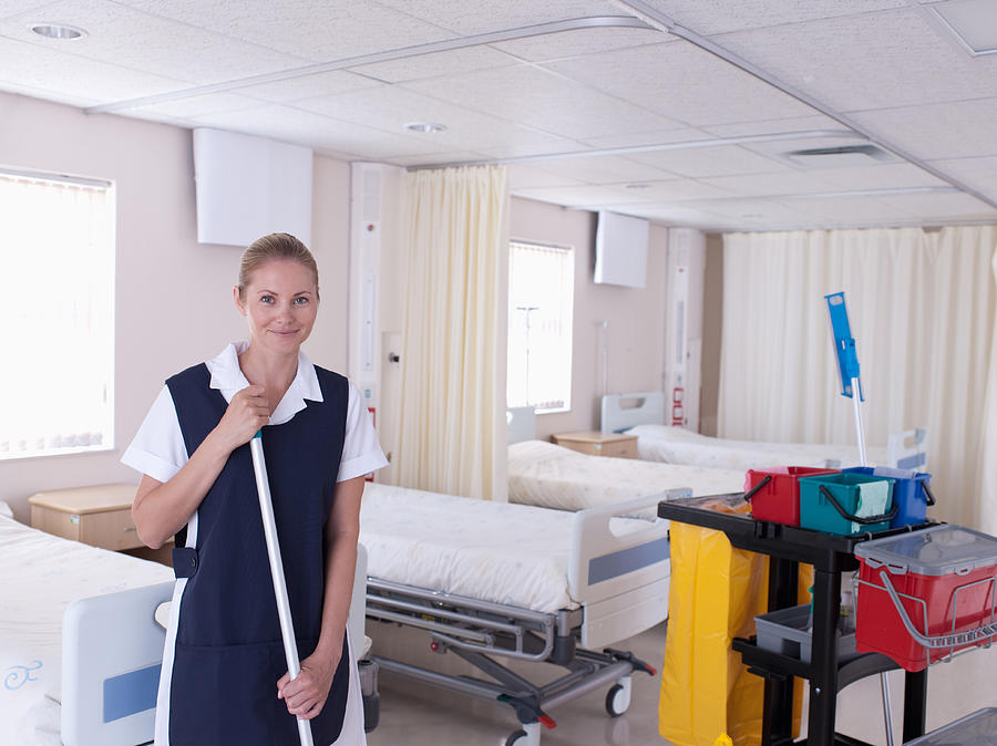 Orderly cleaning hospital Photograph by Robert Daly