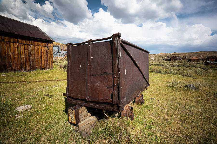 Ore Cart and the Ghost Town of Bodie Photograph by Ron Long Ltd Photography