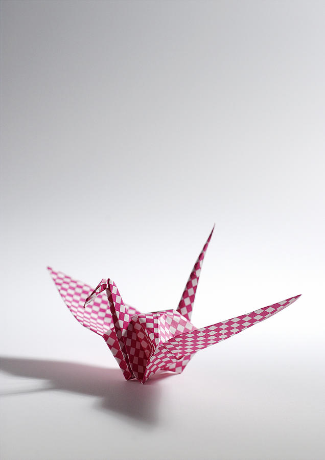Origami paper bird. Photograph by Laurent Hamels