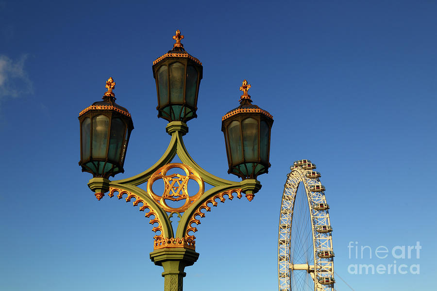 Ornamental street light and Millennium Wheel London UK Photograph by James Brunker
