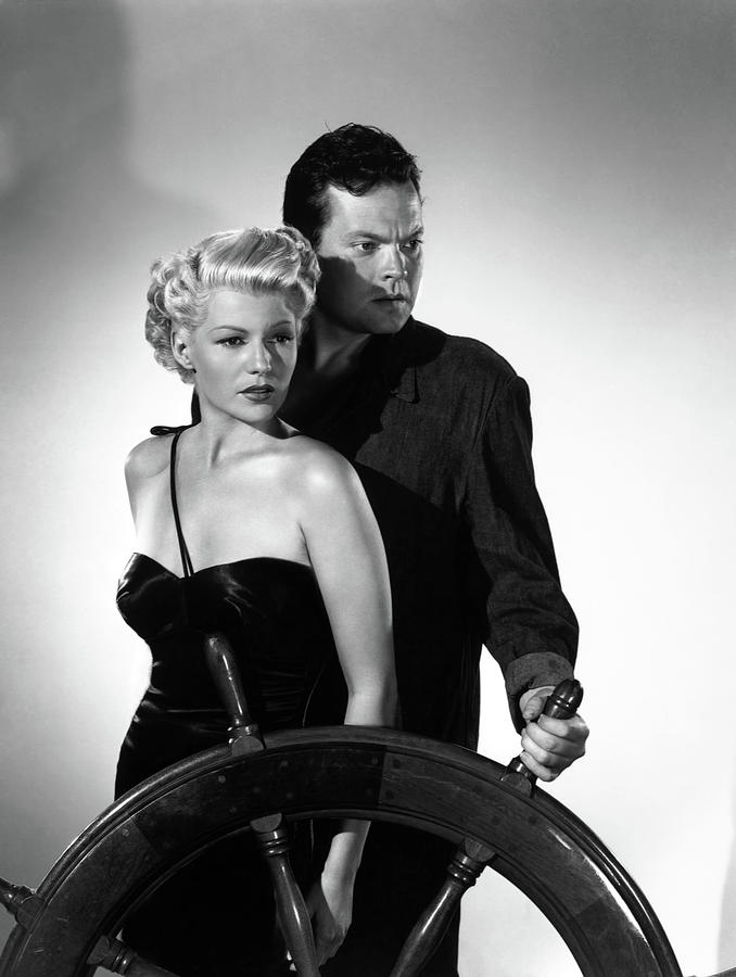 ORSON WELLES and RITA HAYWORTH in THE LADY FROM SHANGHAI -1947-, directed by ORSON WELLES. Photograph by Album
