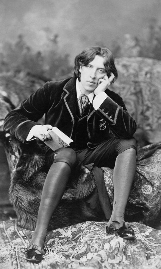 Oscar Wilde Seated With Book Portrait - Napoleon Sarony Circa 1882 Photograph by War Is Hell Store