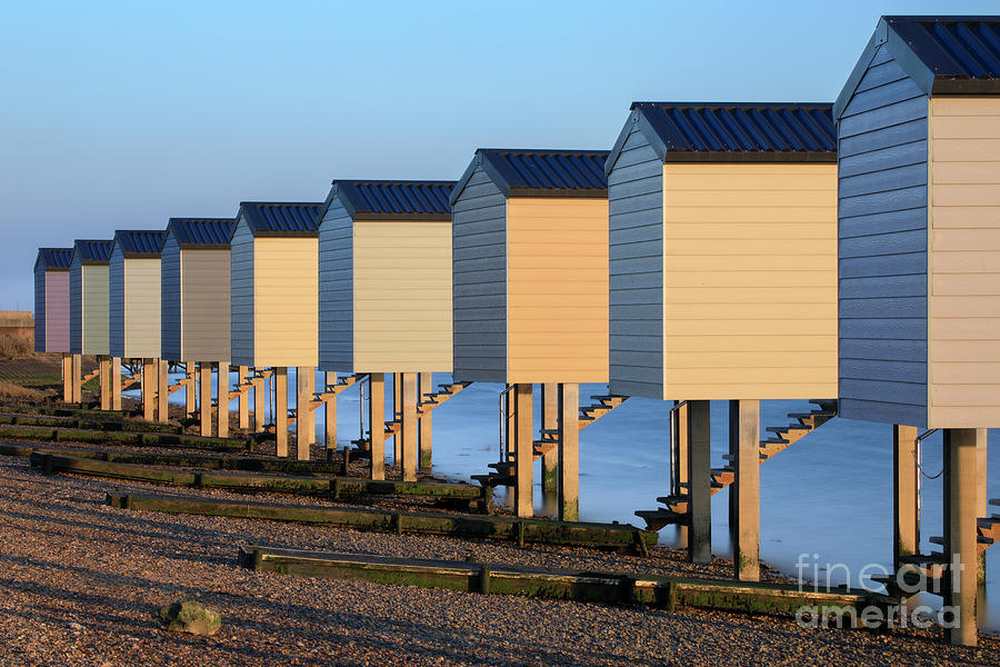 Osea beach huts Photograph by Andrew Ray - Fine Art America