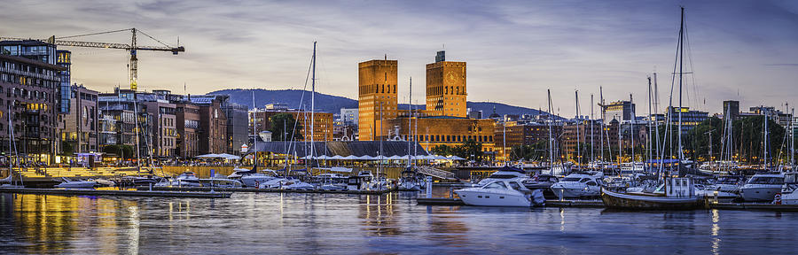 Oslo harbour Aker Brygge City Hall illuminated at dusk Norway Photograph by fotoVoyager