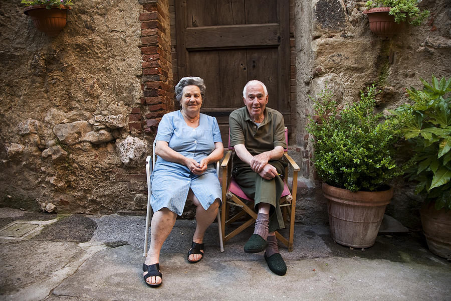 Outdoor portrait of senior couple Photograph by Kari Kohvakka