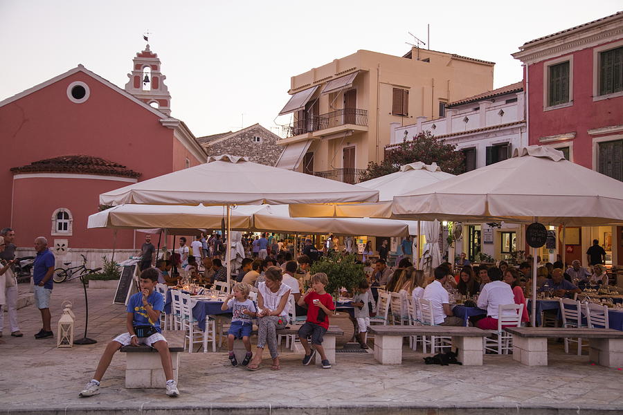 Outdoor restaurant seating in Old Town at sunset Photograph by Holger Leue