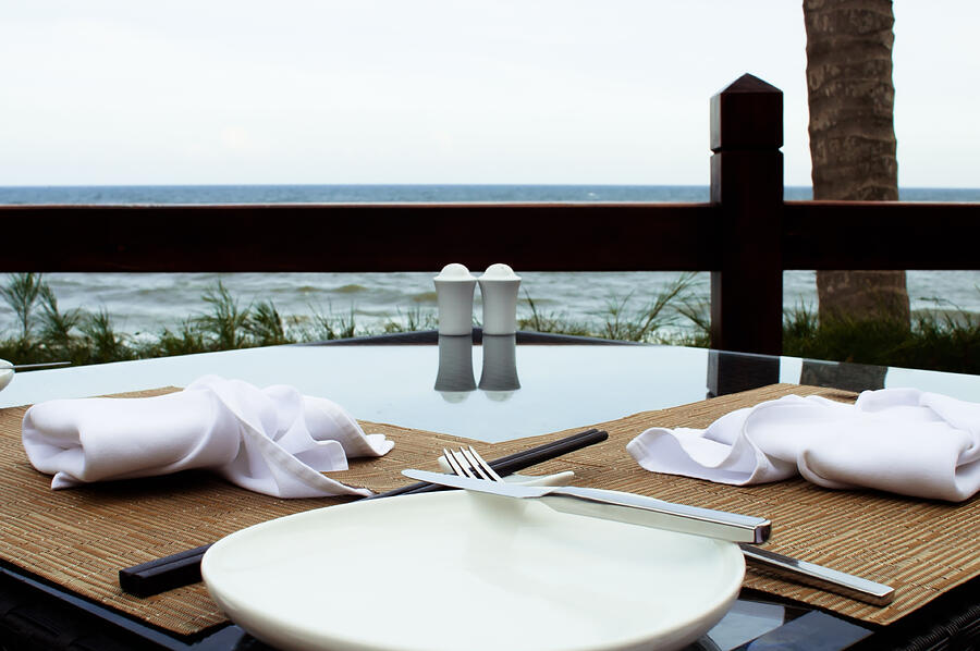 Outdoors decorated table with a sea view Photograph by Aiv1112
