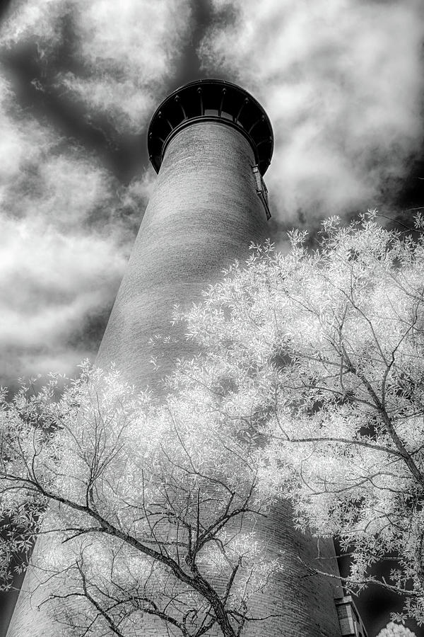 Outer Banks Beach Corolla Lighthouse Glow bw Photograph by Dan Carmichael