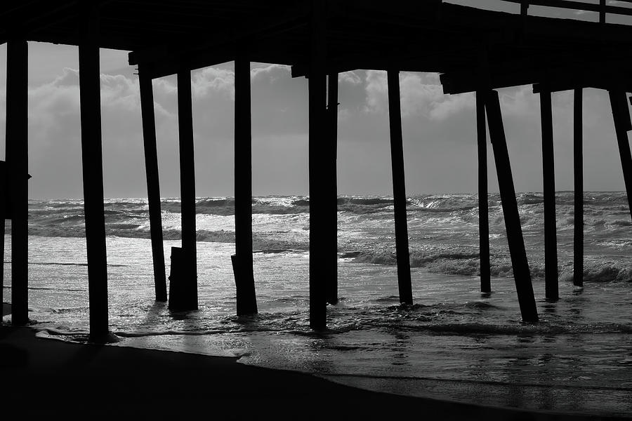 Outer Banks Under the Frisco Pier bw Photograph by Dan Carmichael