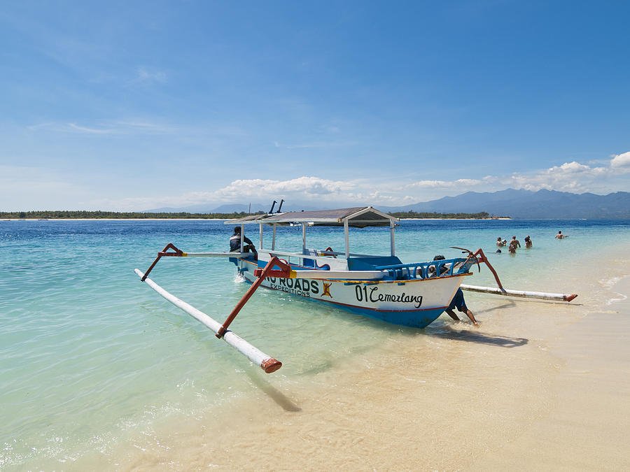 Outrigger boat Gili Islands, Indonesia Photograph by Holgs